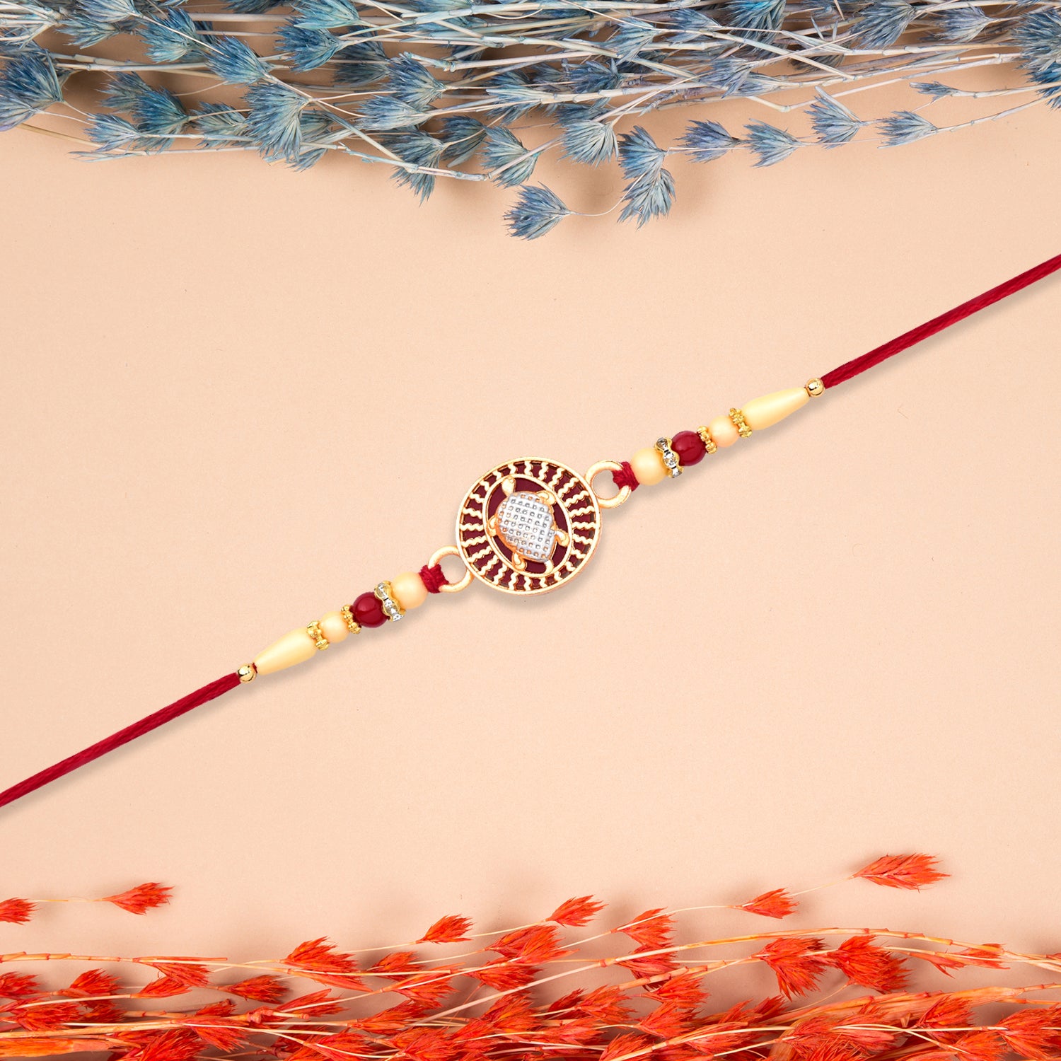 Designer Turtle Rakhi With Beaded Red Thread Designer Turtle Rakhi With Beaded Red Thread
